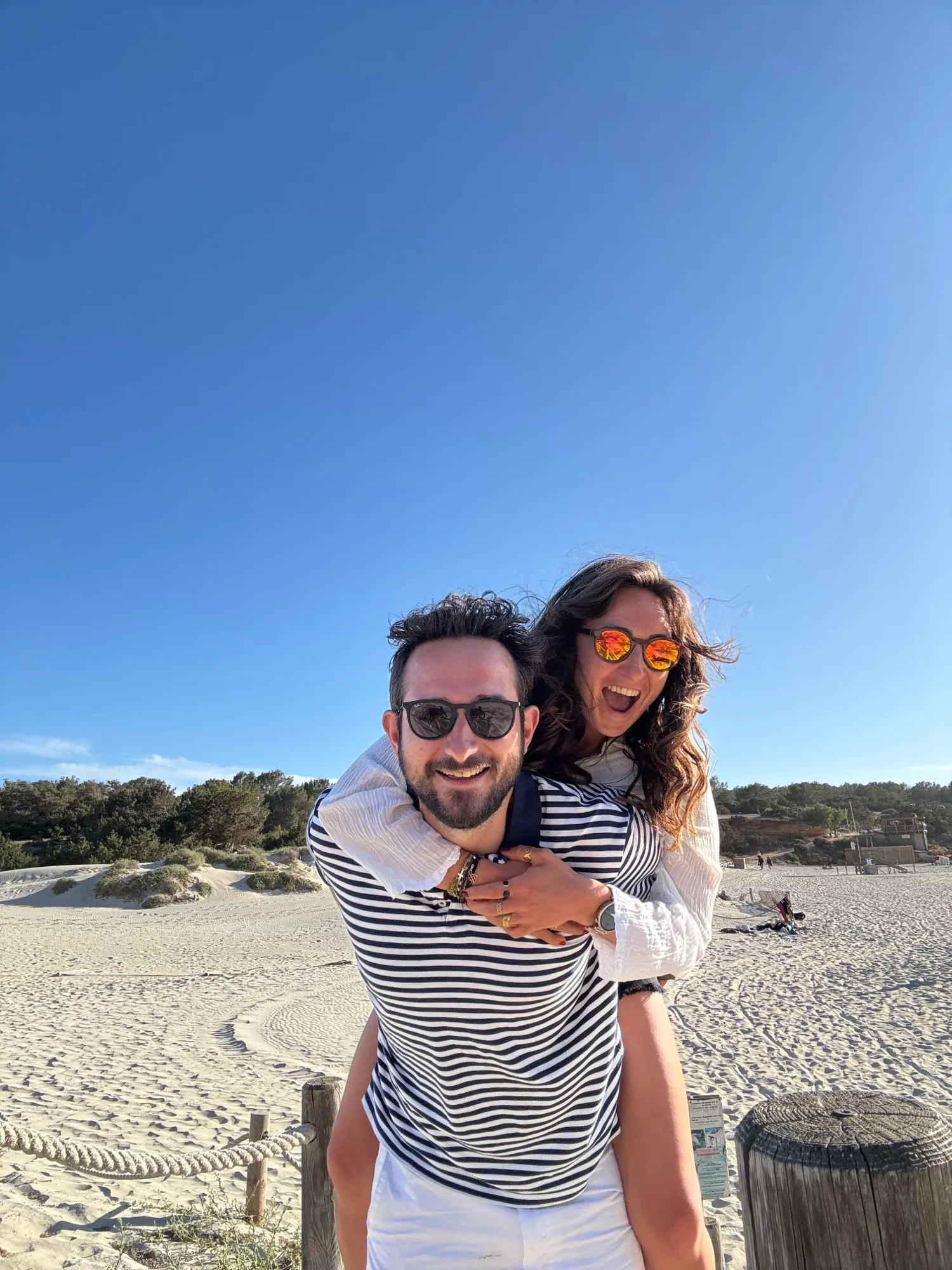 Alejandra and Urban on the beach on a bright summer day
